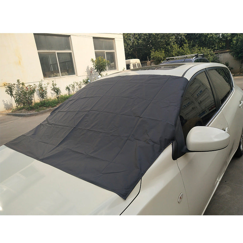 Windshield snow and frost cover in use