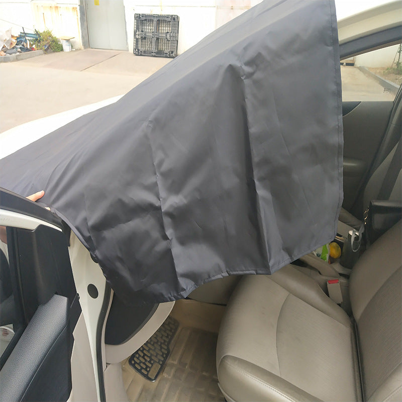 Windshield snow and frost cover in use